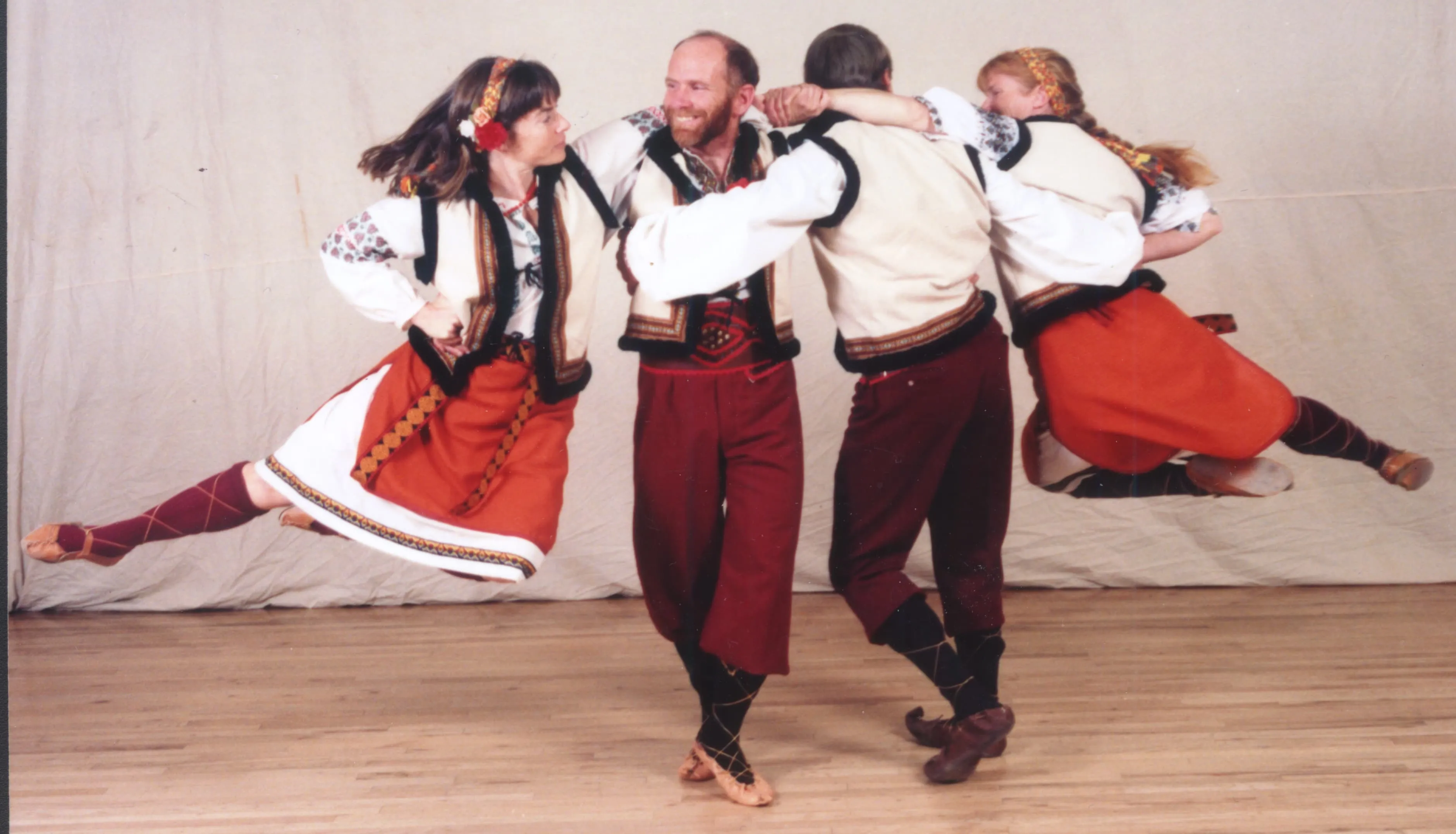 Tom Masterson and a dance partner performing a Ukrainian folk dance flyout.